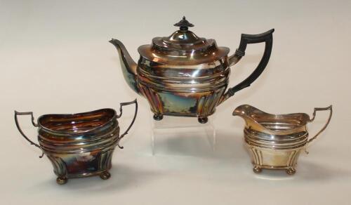 An early 20thC Walker & Hall silver plated three piece tea service