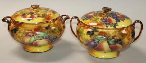 A near matching pair of 20thC Hose Street Pottery tureens