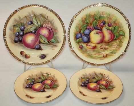 Two near matching 20thC Aynsley bone china cabinet plates