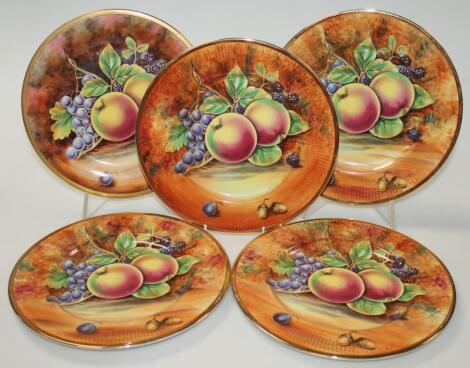 A set of four 20thC Baroness Pottery plates