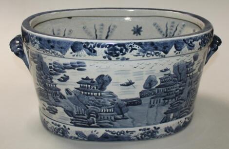 An 18thC style blue and white ironstone foot bath