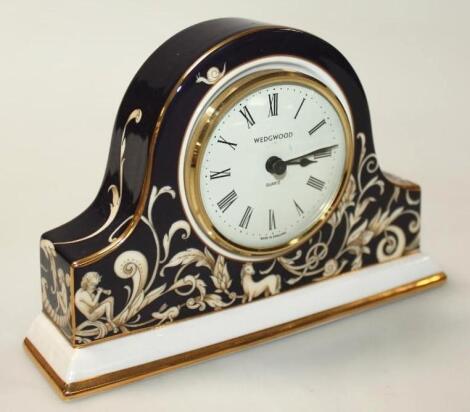 A modern Wedgwood Cornucopia pattern bone china mantel clock