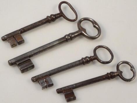 Four various iron keys