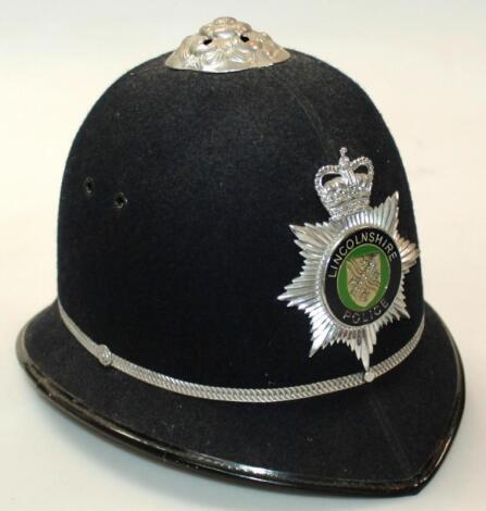 A 20thC policeman's helmet