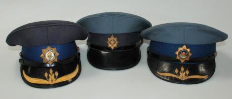 A 20thC blue velvet peaked cap