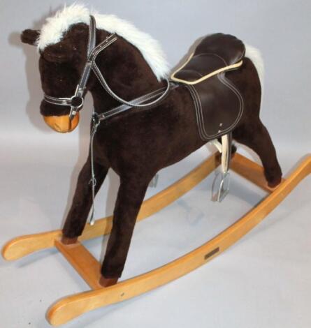 A modern Mamas and Papas rocking horse