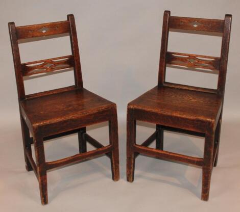 A pair of early 19thC oak dining chairs