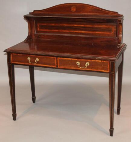 An Edwardian mahogany and boxwood strung writing desk