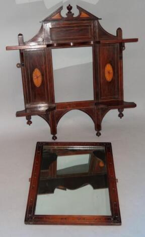An Edwardian rosewood mirror frame