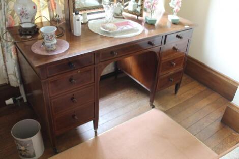 A late 19th/early 20thC Gillows mahogany dressing or writing table