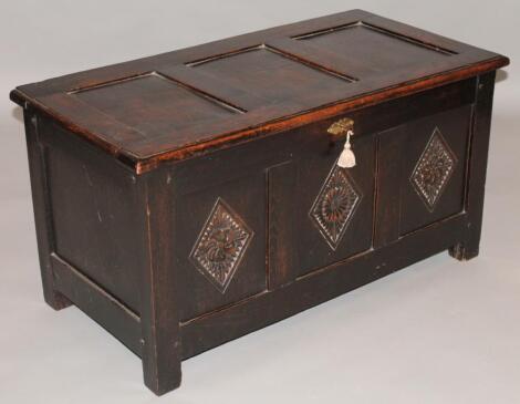 An 18thC style oak three panelled coffer