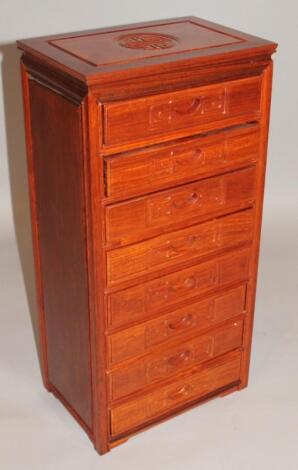 A Chinese hardwood specimen or jewellery cabinet