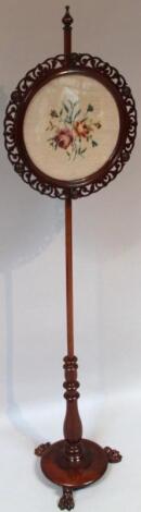 A Victorian mahogany pole screen