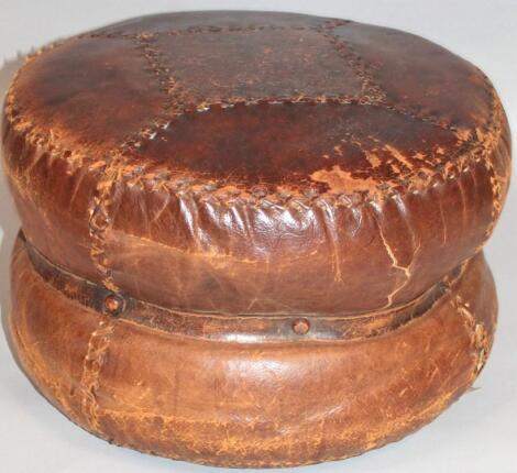 A 20thC leather pouffe