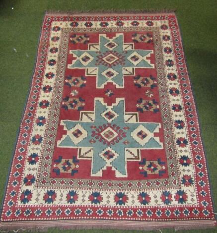 An early 20thC rectangular Middle Eastern rug