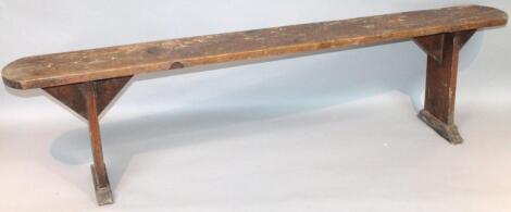 A late 19thC elm bench