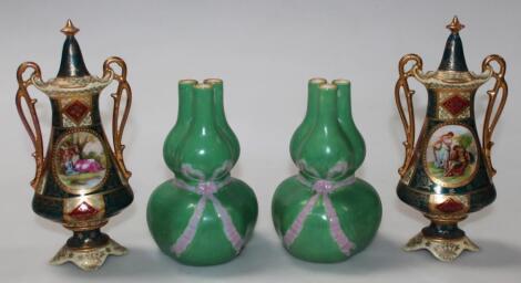 A pair of early 20thC Vienna porcelain vases