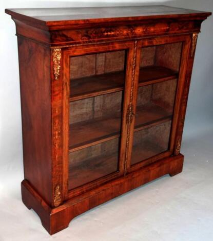 A 19thC walnut and part inlaid pier cabinet