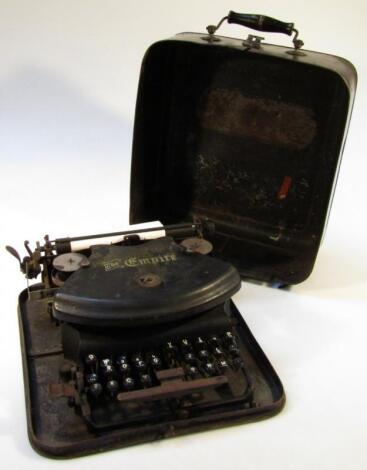 A 1920's or 30's Empire portable typewriter