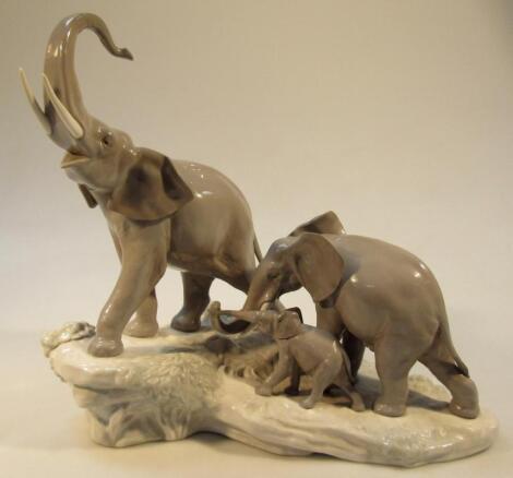 A 20thC Lladro figure group of elephants