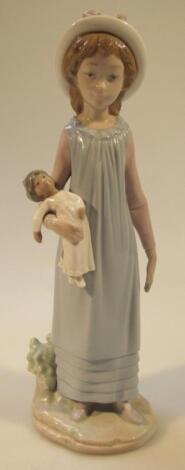 A 20thC Lladro figure of a girl