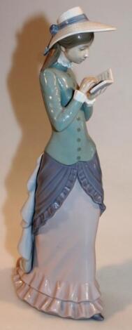 A 20thC Lladro figure of a lady