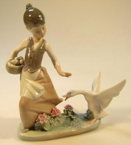 A 20thC Lladro figure of a girl