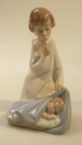 A 20thC Lladro figure of a girl