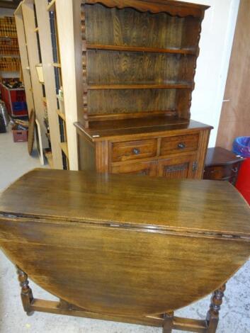 A matched 20thC oak dining room suite