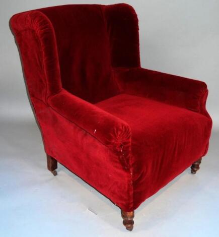 A Victorian mahogany framed wing armchair