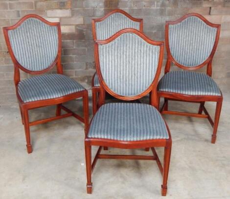 A set of four 20thC mahogany Hepplewhite design shield back boadroom chairs