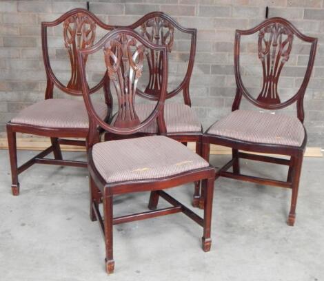 A set of four 20thC mahogany Hepplewhite design shield back boadroom chairs