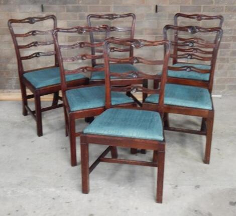 A set of six George III style mahogany ladderback boardroom chairs