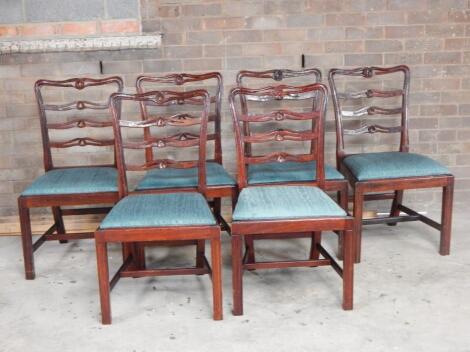 A set of six George III style mahogany ladderback boardroom chairs