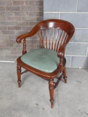 An early 20thC mahogany club office chair