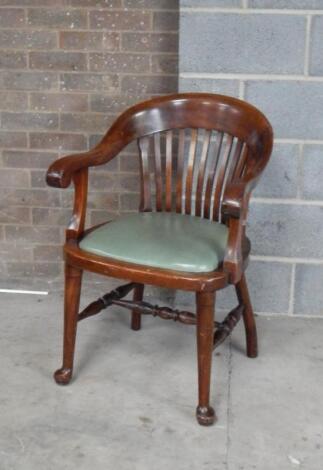 An early 20thC mahogany club office chair