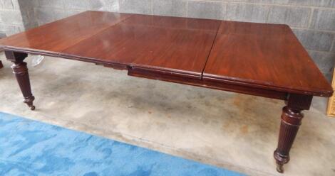 A late 19thC mahogany extending dining table