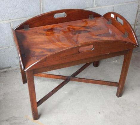 A 20thC mahogany butler's tray on stand