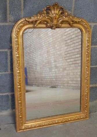 A George II style rococo plaster and giltwood wall mirror