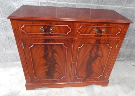 A 20thC flame mahogany finish side cabinet