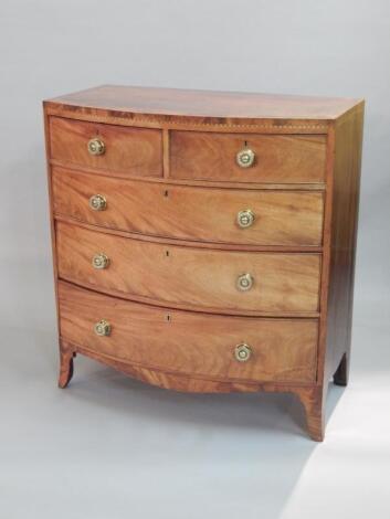 An early 19thC mahogany bow fronted chest of drawers