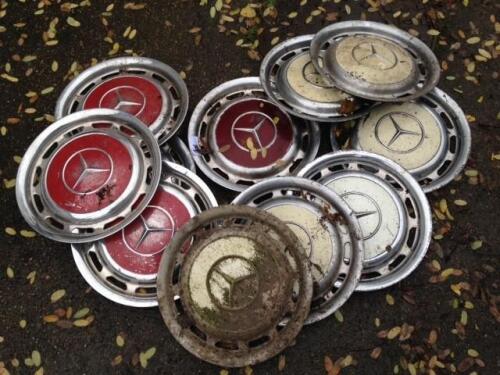 A quantity of Mercedes hubcaps.