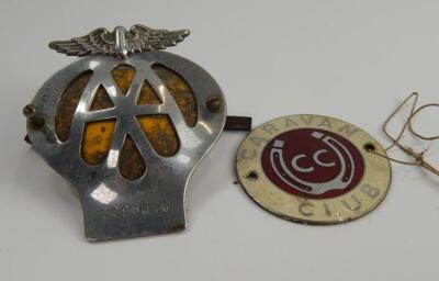 An AA badge and Caravan Club enamelled car badge