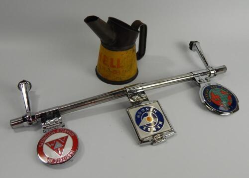 A chrome automobilia badge bar