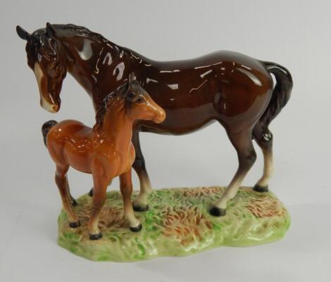 A Beswick figure group of a mare and foal