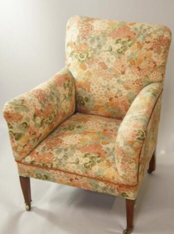 A small upholstered armchair