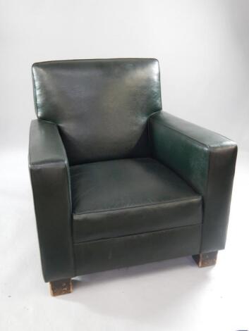 A 1930s style upholstered armed easy chair