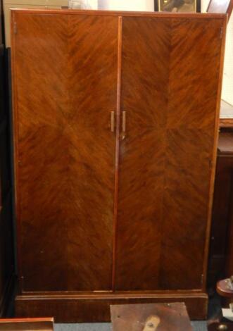 A 1930s mahogany compactum wardrobe