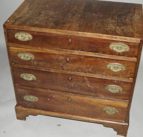 A Georgian mahogany chest of four graduated drawers