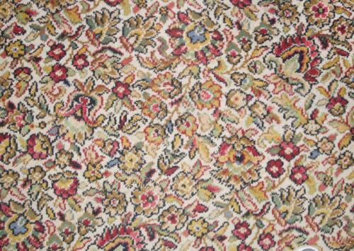 An Axminster Persian style patterned carpet